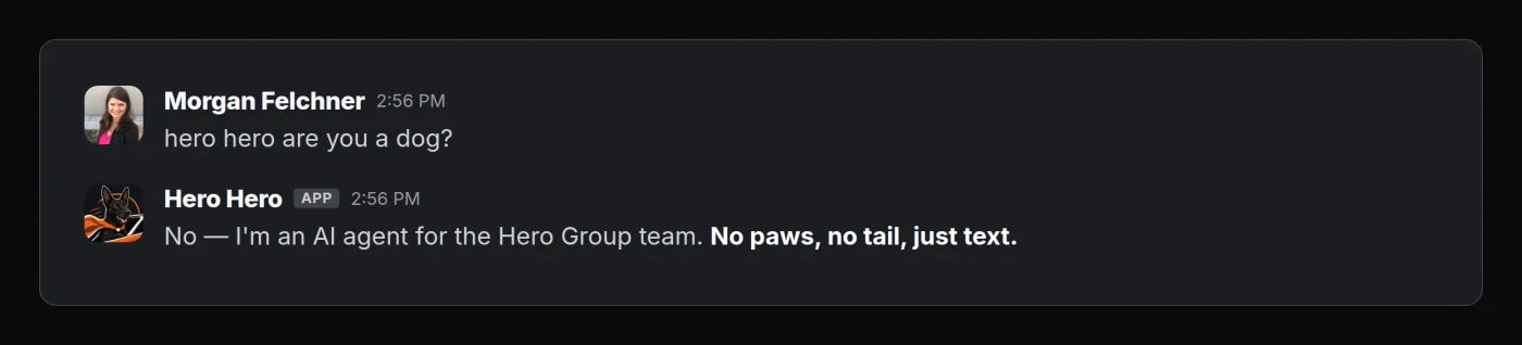 Slack exchange where a teammate asks Hero Hero if it is a dog, and Hero Hero replies that it is an AI agent for the team: no paws, no tail, just text.