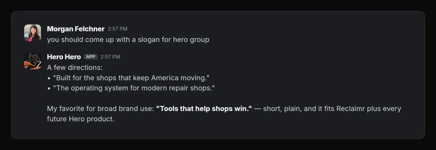Slack exchange where a teammate asks Hero Hero for a Hero Group slogan. Hero Hero gives several slogan options and recommends Tools that help shops win as the strongest brand line.
